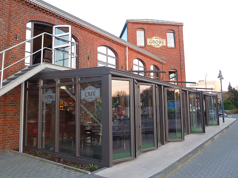 Backhaus Grobe, Dortmund: Aluminiumfenster- und -türelemente mit Korbbogen