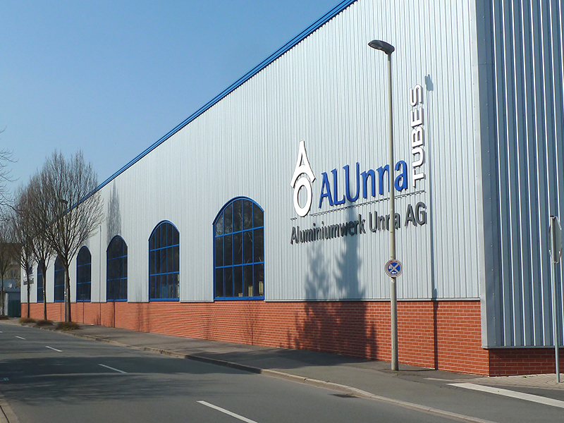 Aluminiumwerk, Unna: Aluminium Pfosten-Riegel-Fassade mit Stichbogen